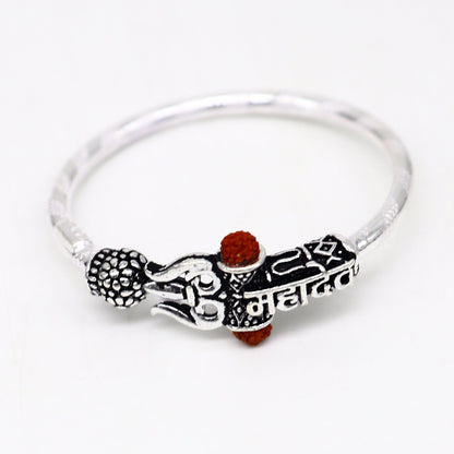 Handmade vintage silver baby bangle with Lord Shiva Mahadeva design, customized antique-style bracelet by TRIBAL ORNAMENTS.