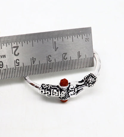 Handmade vintage silver baby bangle with Lord Shiva Mahadeva design, customized tribal ornament bracelet, ideal for gifting.