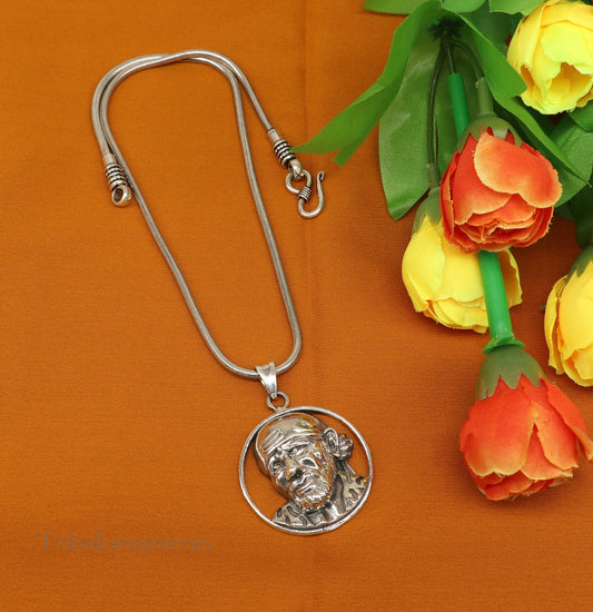Sterling silver Sai Baba pendant by Tribal Ornaments, unisex handmade jewelry featuring a detailed idol design and personalized style.