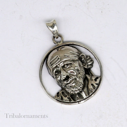 Unisex 925 sterling silver Sai Baba pendant with intricate tribal design, handmade personalized jewelry by TRIBAL ORNAMENTS.