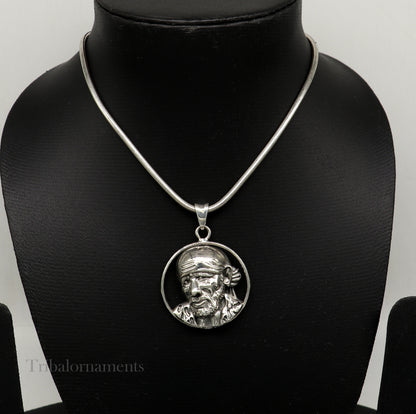 Unisex 925 sterling silver Sai Baba pendant necklace, handmade tribal jewelry with detailed idol design and personalized style.