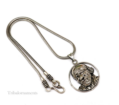 Unisex 925 sterling silver Sai Baba pendant, handmade tribal jewelry with intricate design, personalized religious jewelry by Tribal Ornaments.