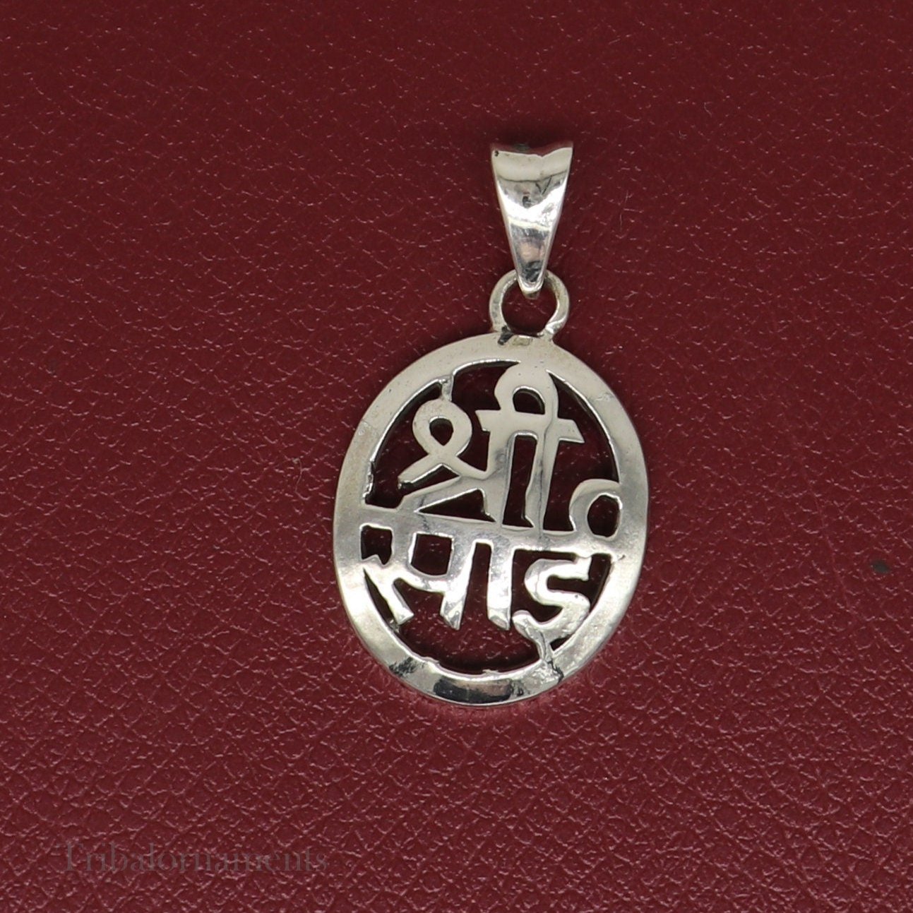925 sterling silver Shree Sai idol pendant, handmade tribal jewelry with intricate design, personalized divine locket from Tribal Ornaments.