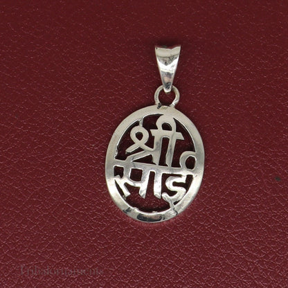 925 sterling silver Shree Sai idol pendant, handmade tribal jewelry with intricate design, personalized divine locket from Tribal Ornaments.