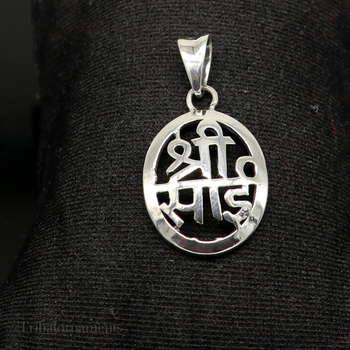 925 sterling silver Shree Sai idol pendant, handmade tribal jewelry with intricate divine design and personalized touch.