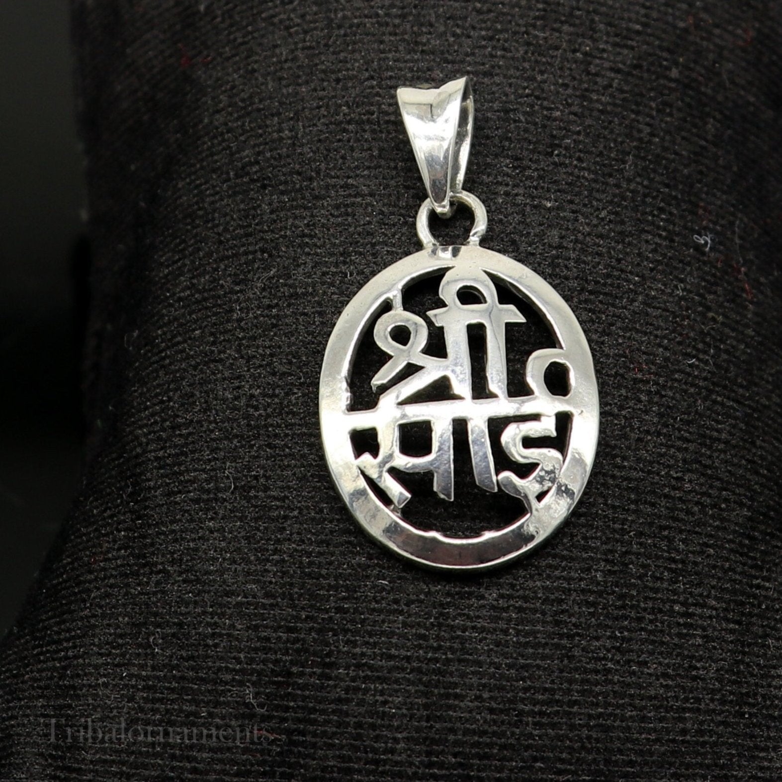 925 sterling silver Shree Sai idol pendant, handmade tribal jewelry with intricate divine design and personalized touch.