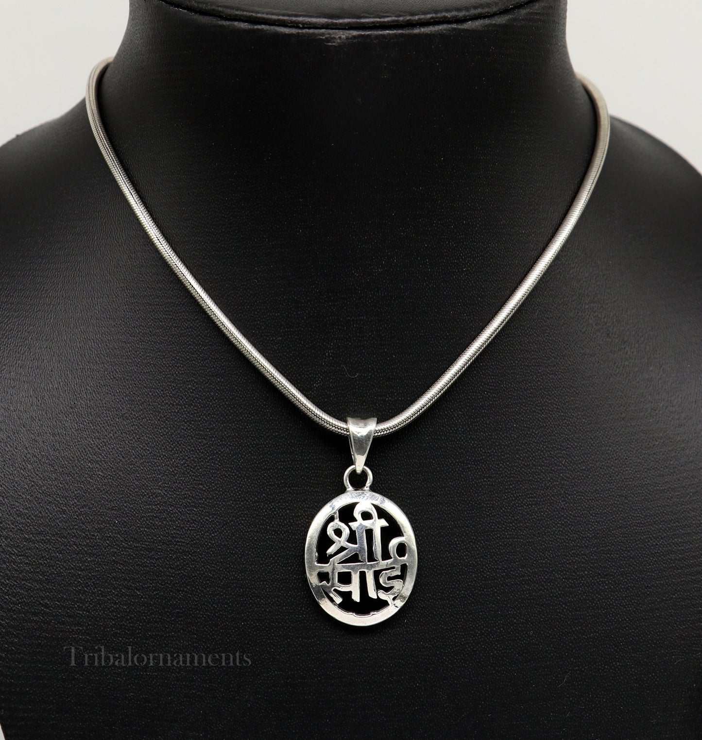 925 sterling silver Shree Sai pendant, handmade tribal jewelry featuring divine idol design, personalized religious pendant.