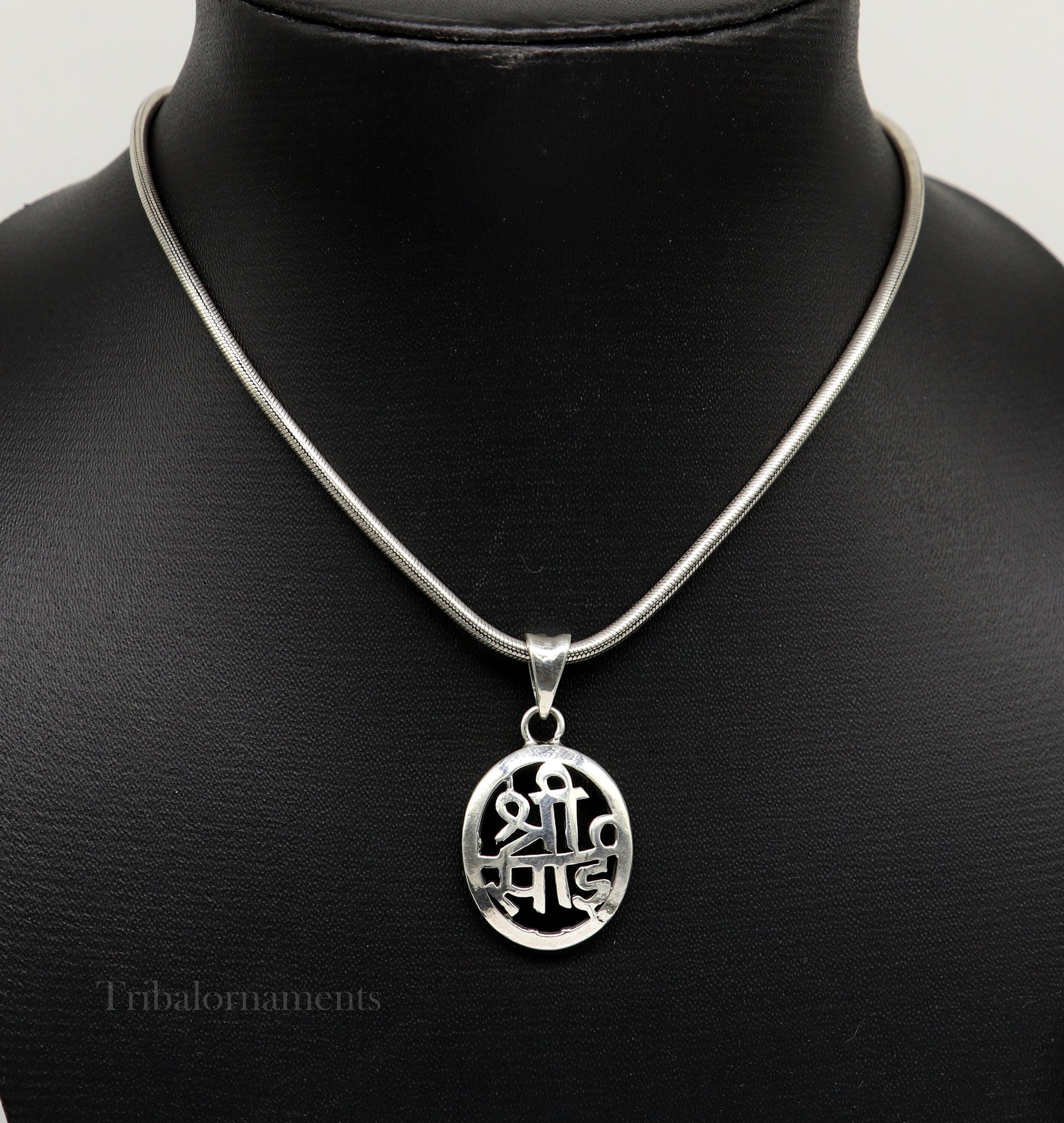 925 sterling silver Shree Sai pendant, handmade tribal jewelry featuring divine idol design, personalized religious pendant.