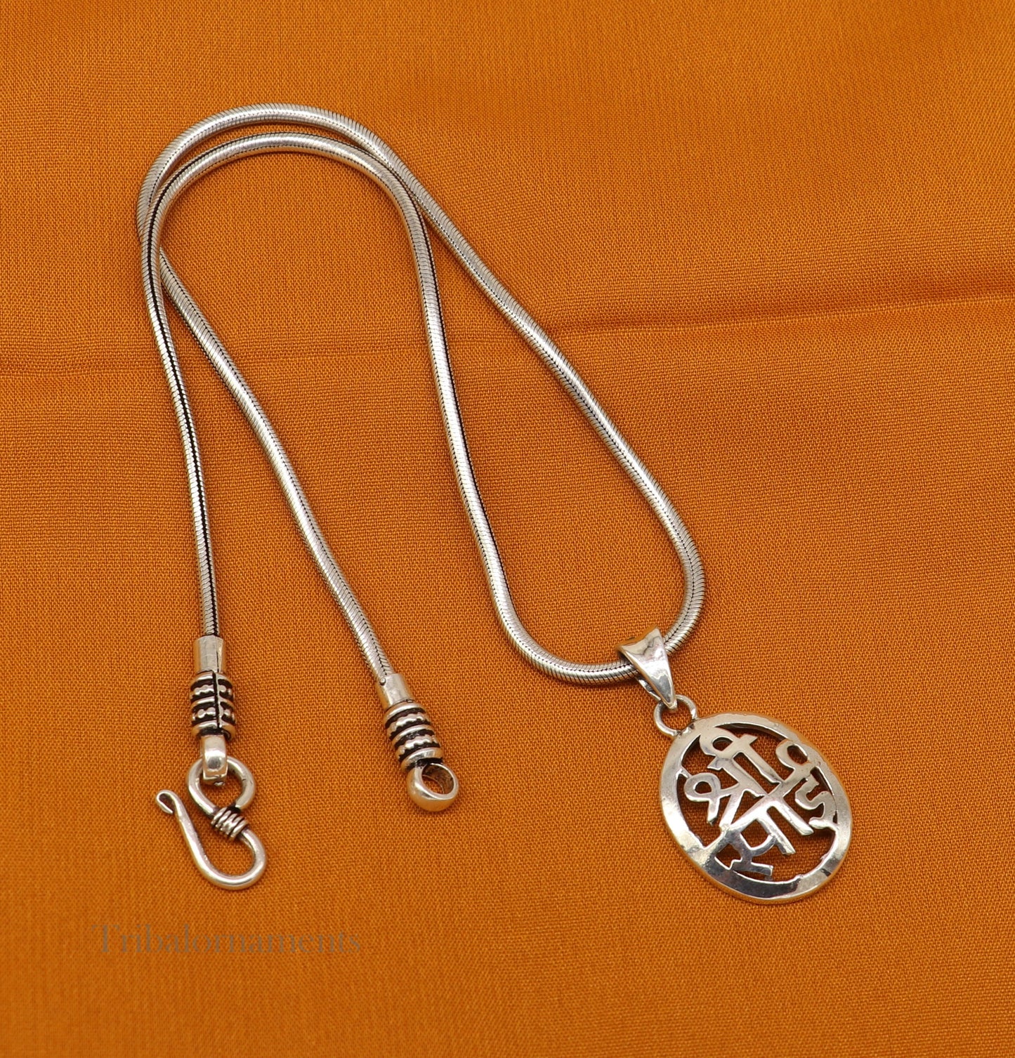 925 sterling silver Shree Sai pendant featuring handcrafted tribal design and personalized jewelry style.