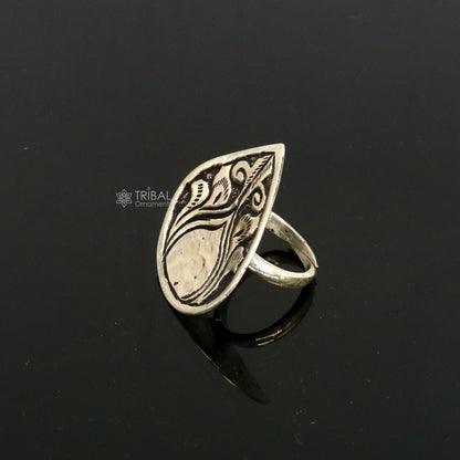 Sterling silver adjustable Indian classical flower design ring with tribal ethnic motifs, ideal for Navratri jewelry.