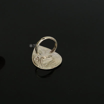 Sterling silver Indian classical adjustable ring with floral tribal design, ideal for Navratri and ethnic jewelry styles.