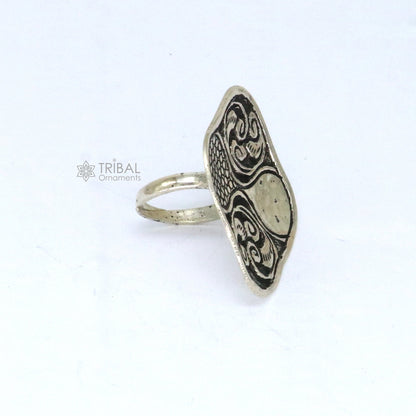 Sterling silver Indian classical floral design adjustable ring with tribal ethnic motifs, ideal for Navratri jewelry.