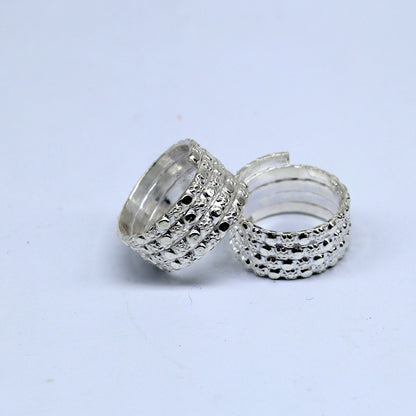 Pair of handmade Indian tribal silver toe rings with spiral design, perfect for boho, belly dance, and hippie jewelry styles.