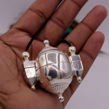 Sterling silver Lord Shiva Lingam pendant in a decorative box, traditional jewelry from Rajasthan by Tribal Ornaments.