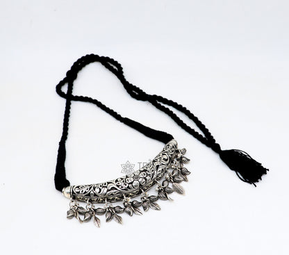 Indian traditional tribal jewelry set featuring a 925 sterling silver customized Kandrai work charm necklace and choker.