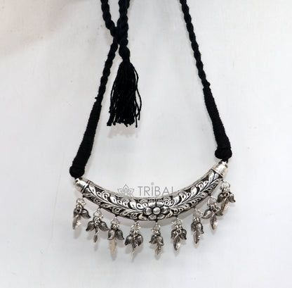 Indian traditional tribal jewelry set featuring a 925 sterling silver kandrai work charm necklace and choker with Hasali design.