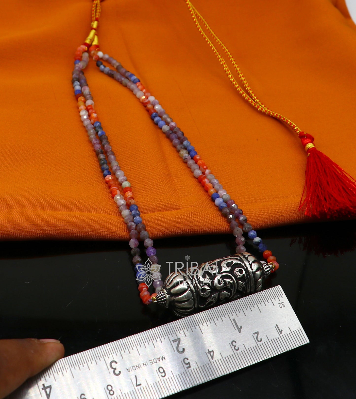 Indian tribal jewelry set featuring a beaded sterling silver choker necklace with traditional Nakshi work and natural stones.