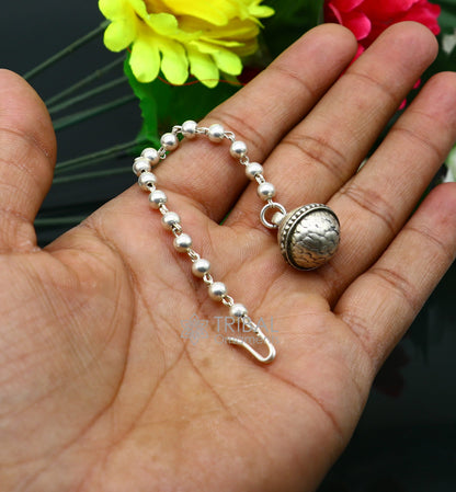 Vintage Indian tribal mangtika hair jewelry in 925 sterling silver with intricate traditional design for ethnic head adornment.