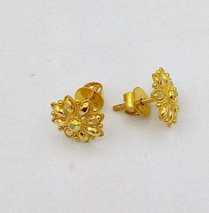 22Kt yellow gold handmade flower design stud earrings by TRIBAL ORNAMENTS, traditional Indian hand-carved jewelry for women.