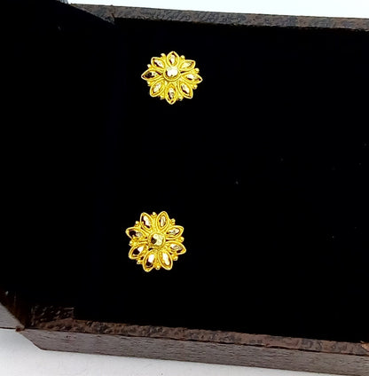 22Kt yellow gold handmade flower design stud earrings by TRIBAL ORNAMENTS, traditional Indian hand-carved jewelry for women.