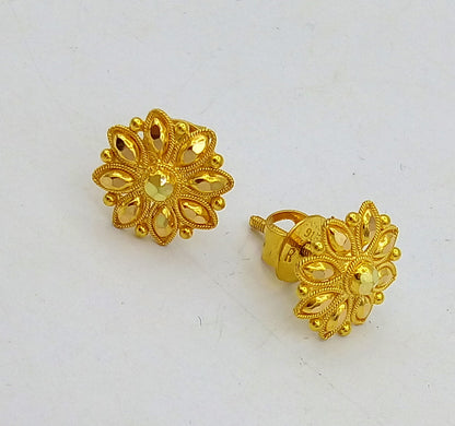 22Kt yellow gold handmade flower design stud earrings by TRIBAL ORNAMENTS, traditional Indian carved jewelry for women.