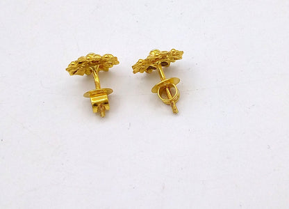 22Kt yellow gold handmade flower design stud earrings by TRIBAL ORNAMENTS, traditional Indian hand-carved jewelry for women