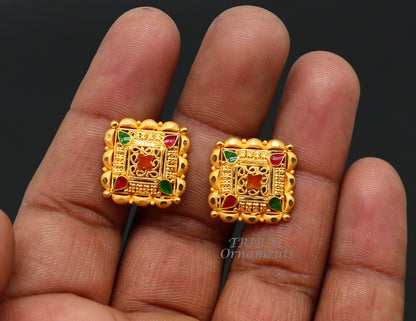 Hand-carved Indian traditional flower design 22K yellow gold stud earrings for women by Tribal Ornaments.