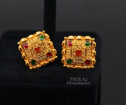 Hand-carved Indian traditional flower design 22K yellow gold stud earrings for women, showcasing intricate craftsmanship and floral details.