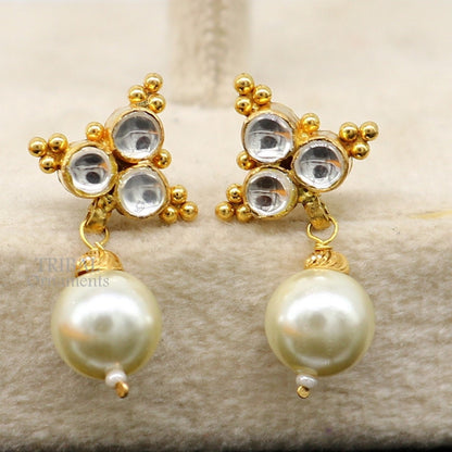 Indian handmade Kundan work 22K yellow gold stud earrings with hanging pearl, traditional tribal jewelry design.