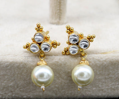 Indian handmade Kundan work 22KT yellow gold stud earrings with hanging pearl, traditional tribal jewelry design.