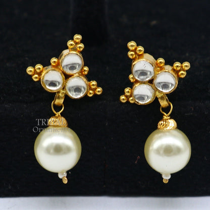 Indian handmade Kundan work 22K yellow gold stud earrings with hanging pearl, traditional tribal jewelry design.