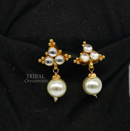 Indian handmade Kundan work 22KT yellow gold stud earrings with hanging pearl, featuring intricate traditional design.