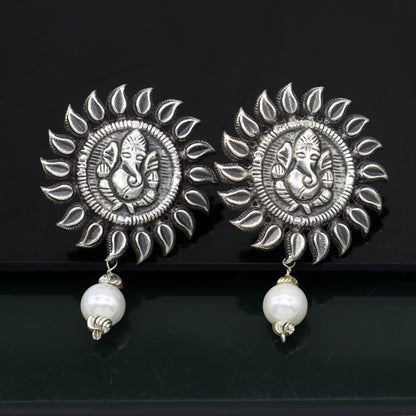 Sterling silver Lord Ganesha stud earrings featuring traditional tribal Ganesha design from Rajasthan India by TRIBAL ORNAMENTS