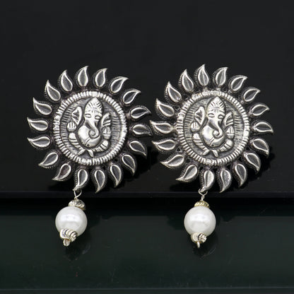 Sterling silver Lord Ganesha stud earrings with tribal design, handmade from Rajasthan, India, by TRIBAL ORNAMENTS.
