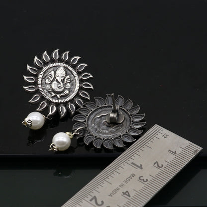 925 silver Lord Ganesha stud earrings from Rajasthan, handmade tribal jewelry featuring intricate Ganesha design.