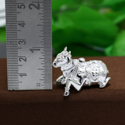 Small Lord Shiva Vahan Nandi Maharaj statue in solid 925 sterling silver, handcrafted for puja and divine worship.