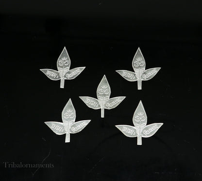 Set of 5 handmade solid silver Belva Patra leaves for Shiva worship, featuring intricate designs and Shiva mantras on each leaf.