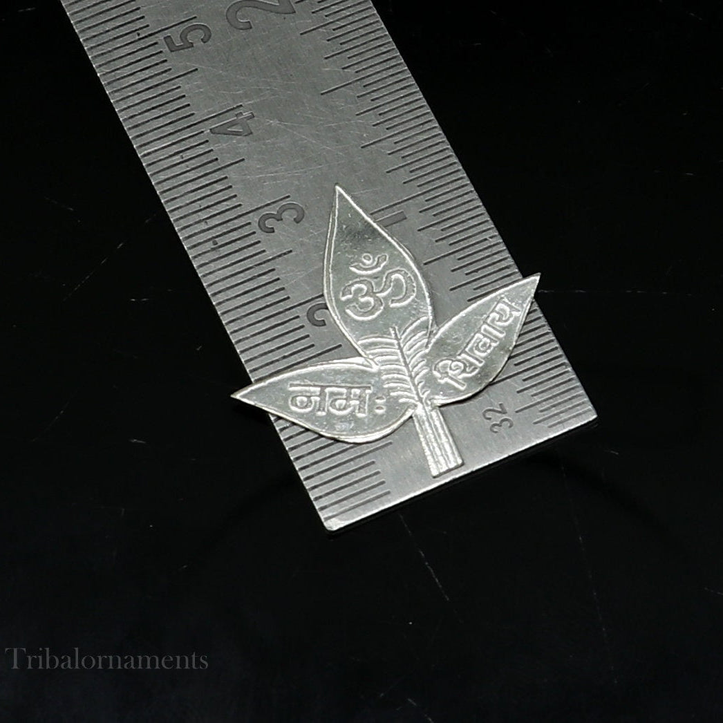 Set of 5 solid silver handmade Belva leaves for Shiva worship, featuring Shiva mantra, crafted by Tribal Ornaments.