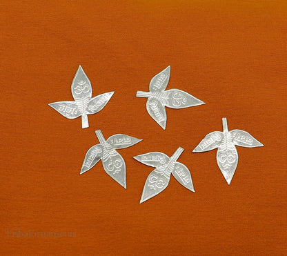 Set of 5 handmade solid silver Belva Patra leaves for Shiva worship, featuring Shiva mantras, crafted by Tribal Ornaments.