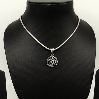 Sterling silver OM AUM pendant by TRIBAL ORNAMENTS, stylish handmade unisex jewelry featuring a personalized design.