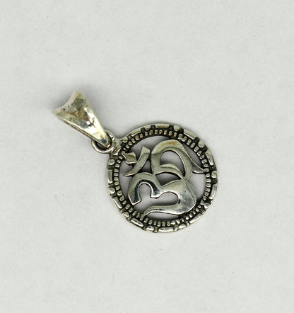 Sterling silver OM AUM pendant by Tribal Ornaments, handmade unisex jewelry with intricate design, stylish personalized silver necklace
