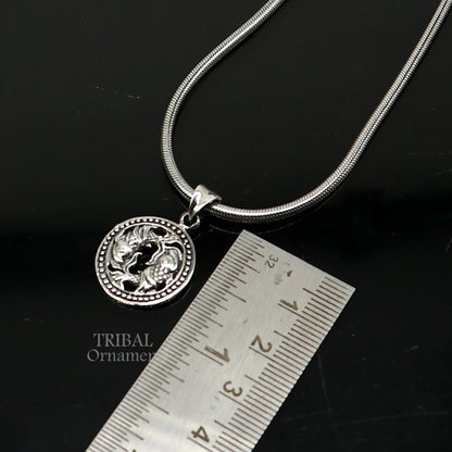 Sterling silver Pisces zodiac sign pendant featuring the "Meen Rashi" symbol, tribal-inspired design, jewelry accessory.
