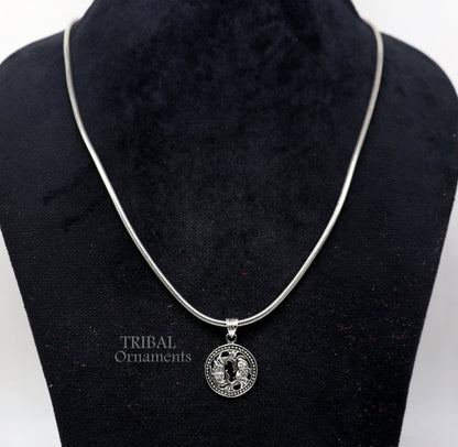 Sterling silver Pisces zodiac sign pendant featuring the "Meen Rashi" symbol, tribal-inspired horoscope jewelry.