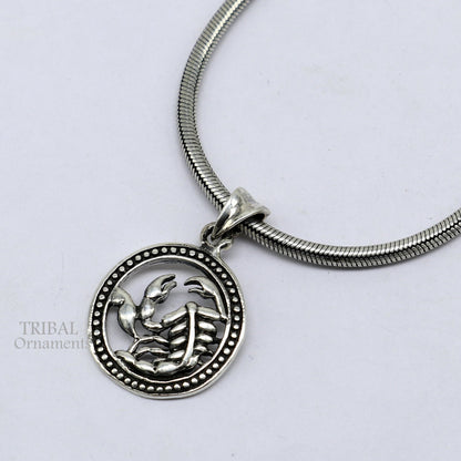 Sterling silver Scorpio zodiac pendant featuring the Scorpio symbol, designed by Tribal Ornaments, with a modern and unique style.