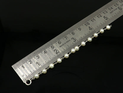 Natural pearl beaded baby bracelet made of 925 sterling silver, handmade and customized baby jewelry by TRIBAL ORNAMENTS.