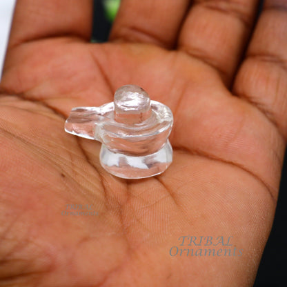 Natural sphatik crystal Shiva Lingam statue by TRIBAL ORNAMENTS, ideal for puja, wealth, and prosperity rituals.