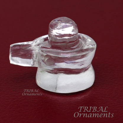 Natural Sphatik crystal Shiva Lingam statue by Tribal Ornaments, used for puja, wealth, and prosperity rituals.