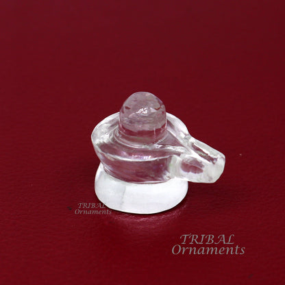 Natural Sphatik crystal Shiva Lingam statue by Tribal Ornaments, a divine stone for wealth and prosperity, used in puja rituals.