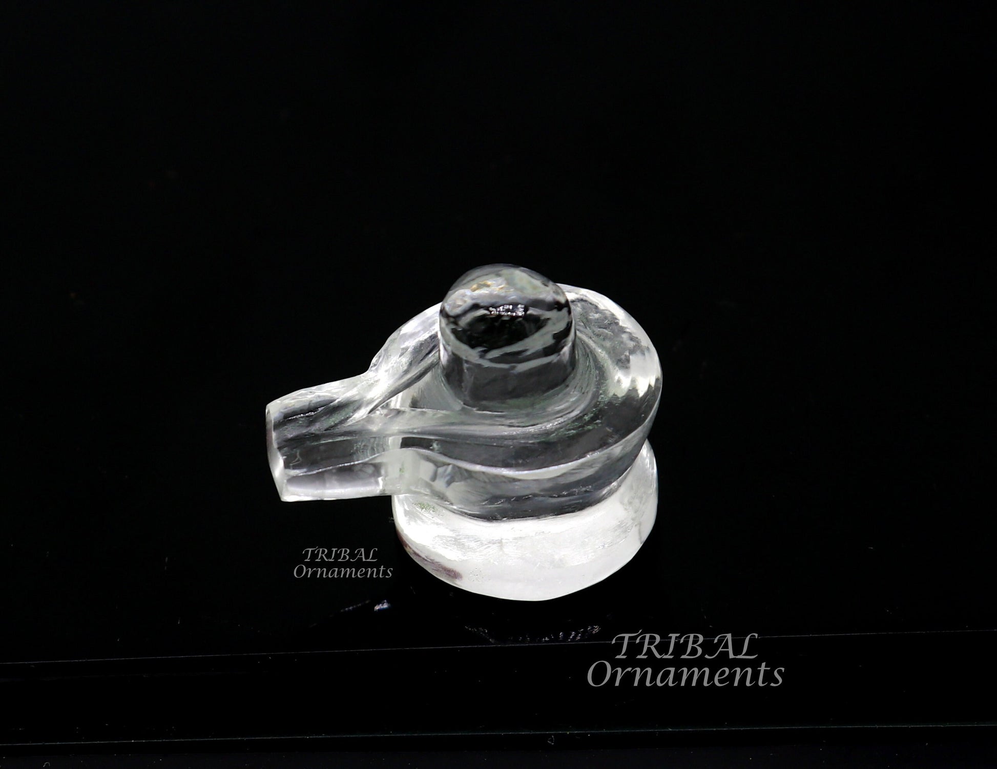 Natural sphatik crystal Shiva Lingam statue by TRIBAL ORNAMENTS, a divine stone for wealth and prosperity puja.