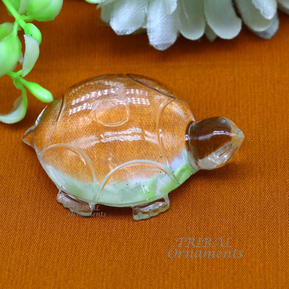 Natural sphatik crystal tortoise statue by TRIBAL ORNAMENTS, showcasing a divine turtle figure for wealth and prosperity.